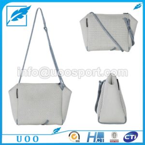 UOO Perforated Neoprene Punch cross-body Bag UOO Perforated Neoprene Punch cross-body Bag