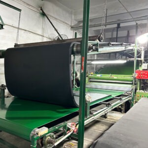 High-precision neoprene sheet splitting machine processing raw material thickness at UooSport factory