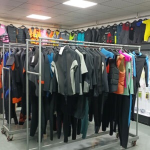 OEM wetsuits and life jackets displayed in UooSport showroom showing custom manufacturing quality
